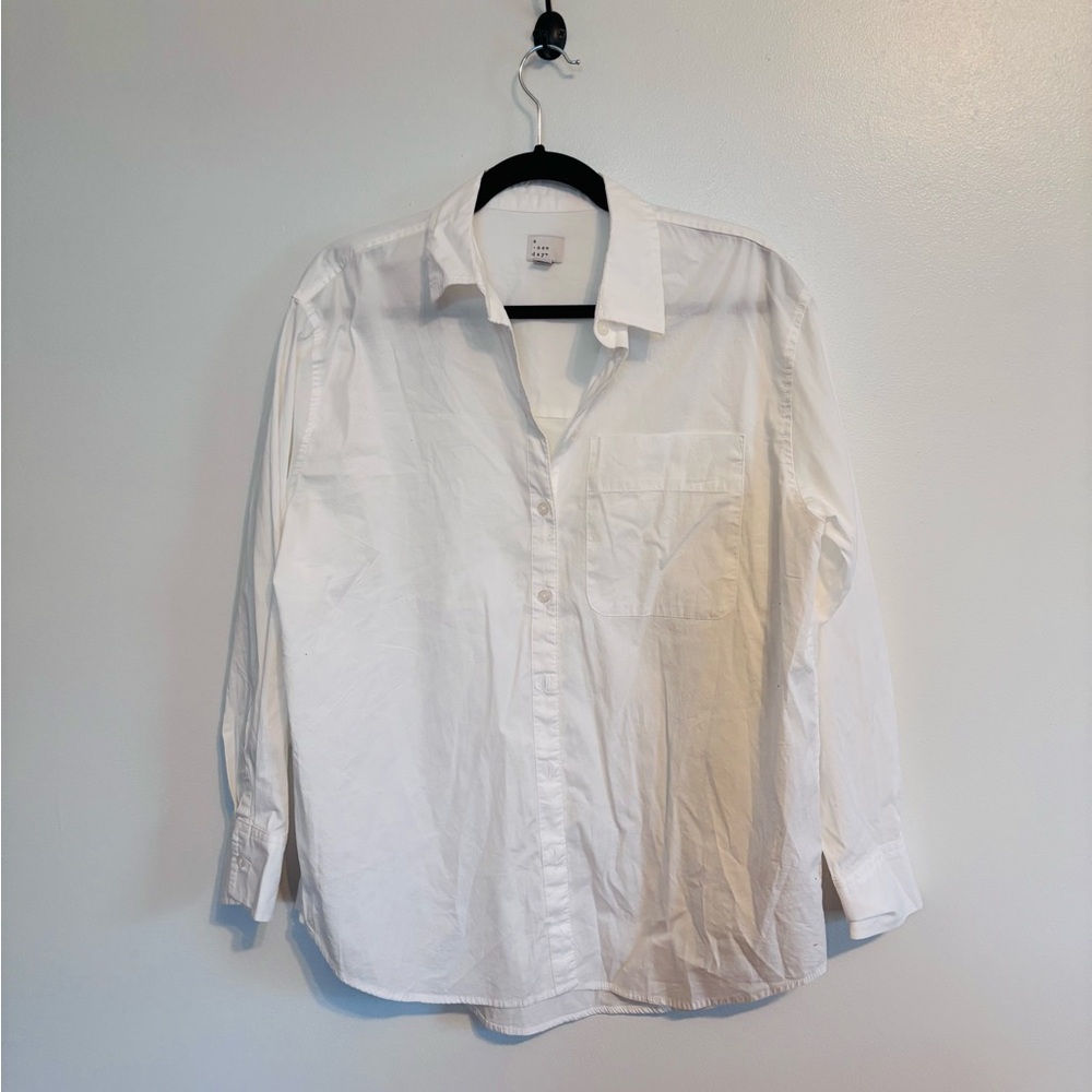 A new day white long sleeve button up with collar size small with breast pocket